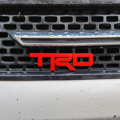 TRD Red Grille Metal Emblem (12 x 3.5 cm)