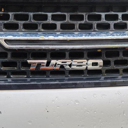 Turbo Silver Grille Metal Emblem (14.9 x 3.2 cm)