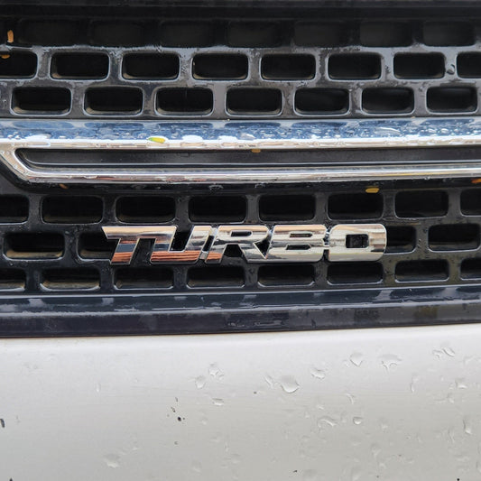 Turbo Silver Grille Metal Emblem (14.9 x 3.2 cm)