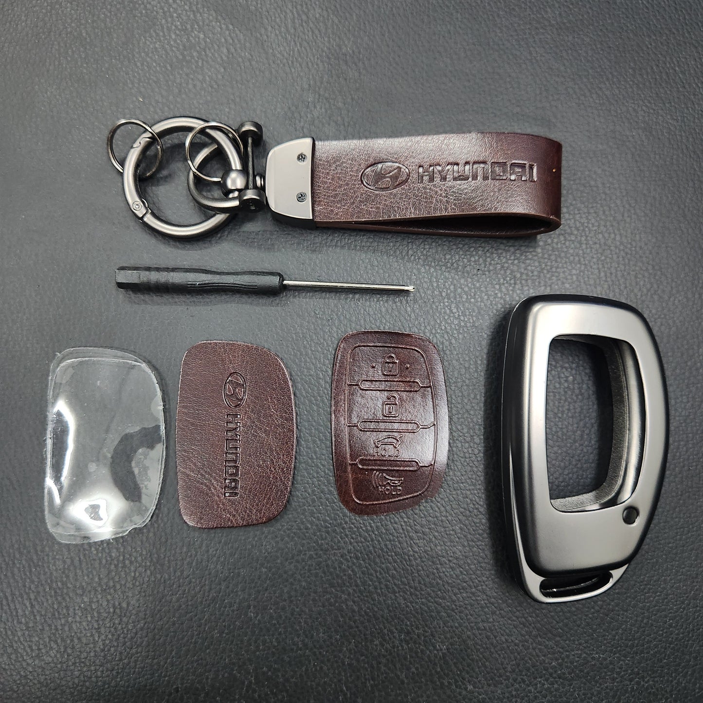 Hyundai Alcazar/Creta/Venue/i20 (4 Button Key) Metal Alloy Leather Keycase with Holder & Rope Chain