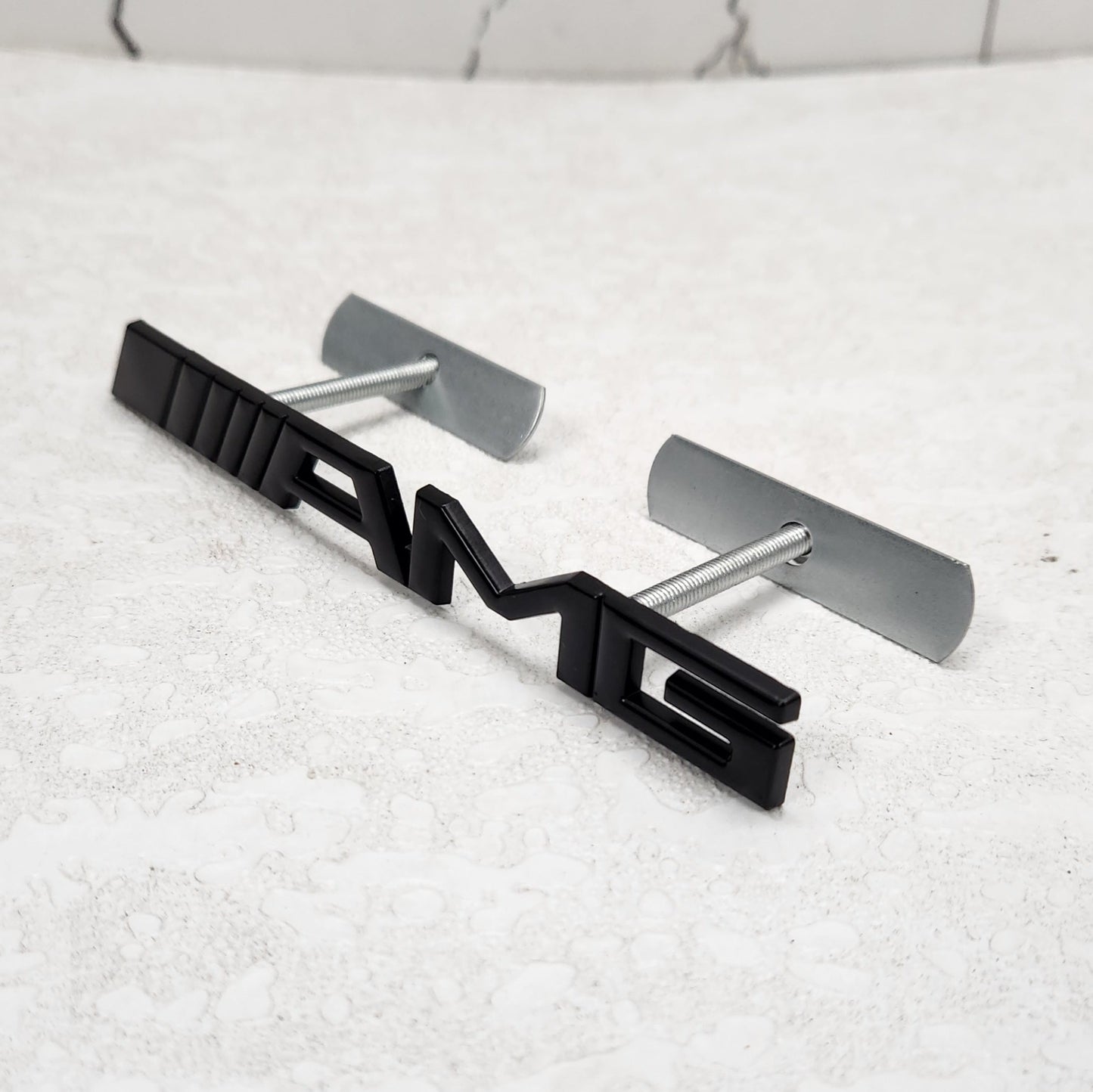 AMG Black Grille Metal Emblem (15.5 x 1.5 cm)