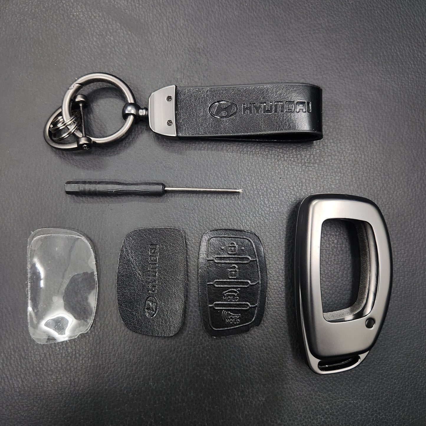 Hyundai Alcazar/Creta/Venue/i20 (4 Button Key) Metal Alloy Leather Keycase with Holder & Rope Chain